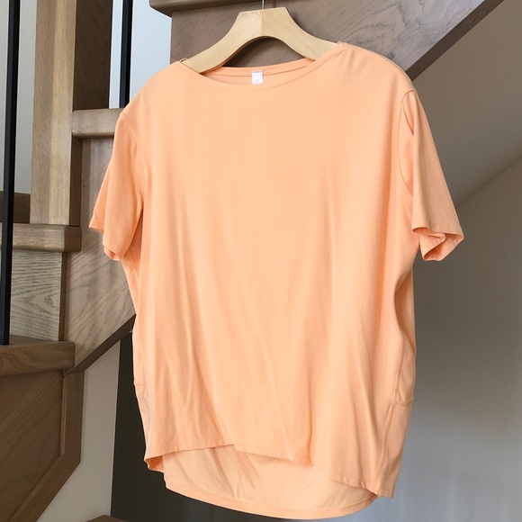 lululemon athletica Tops - Lululemon Back in Action Short Sleeve T-Shirt *Nulu Peach Satin, Size 4 Like New